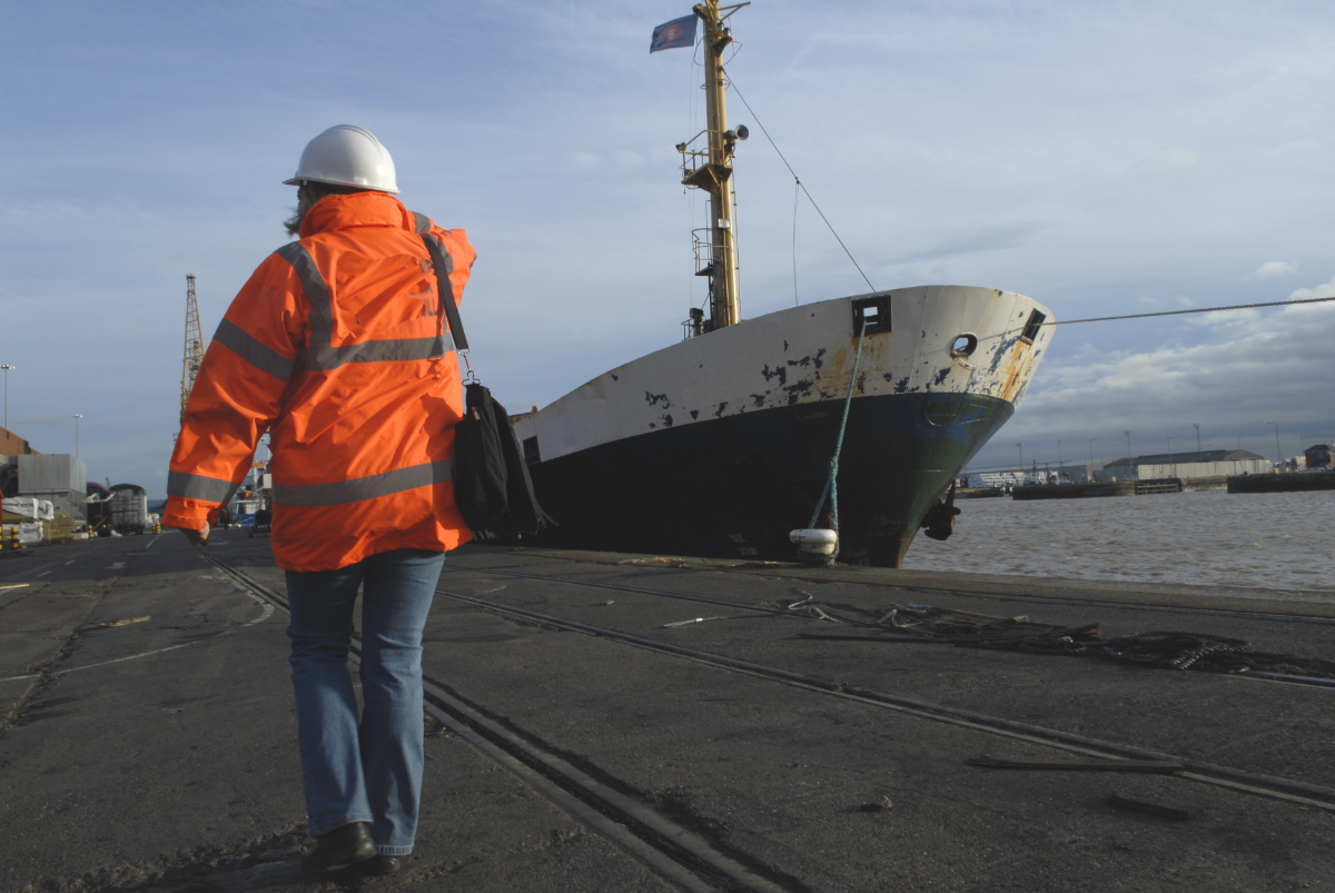 Volunteering walking towards a ship